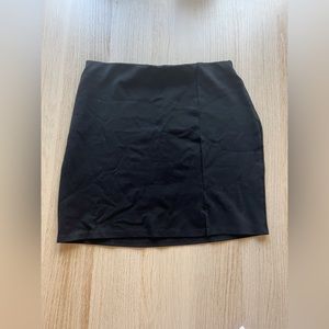 Black mini skirt with slit